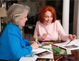 two ladies enjoying their scrapbooking